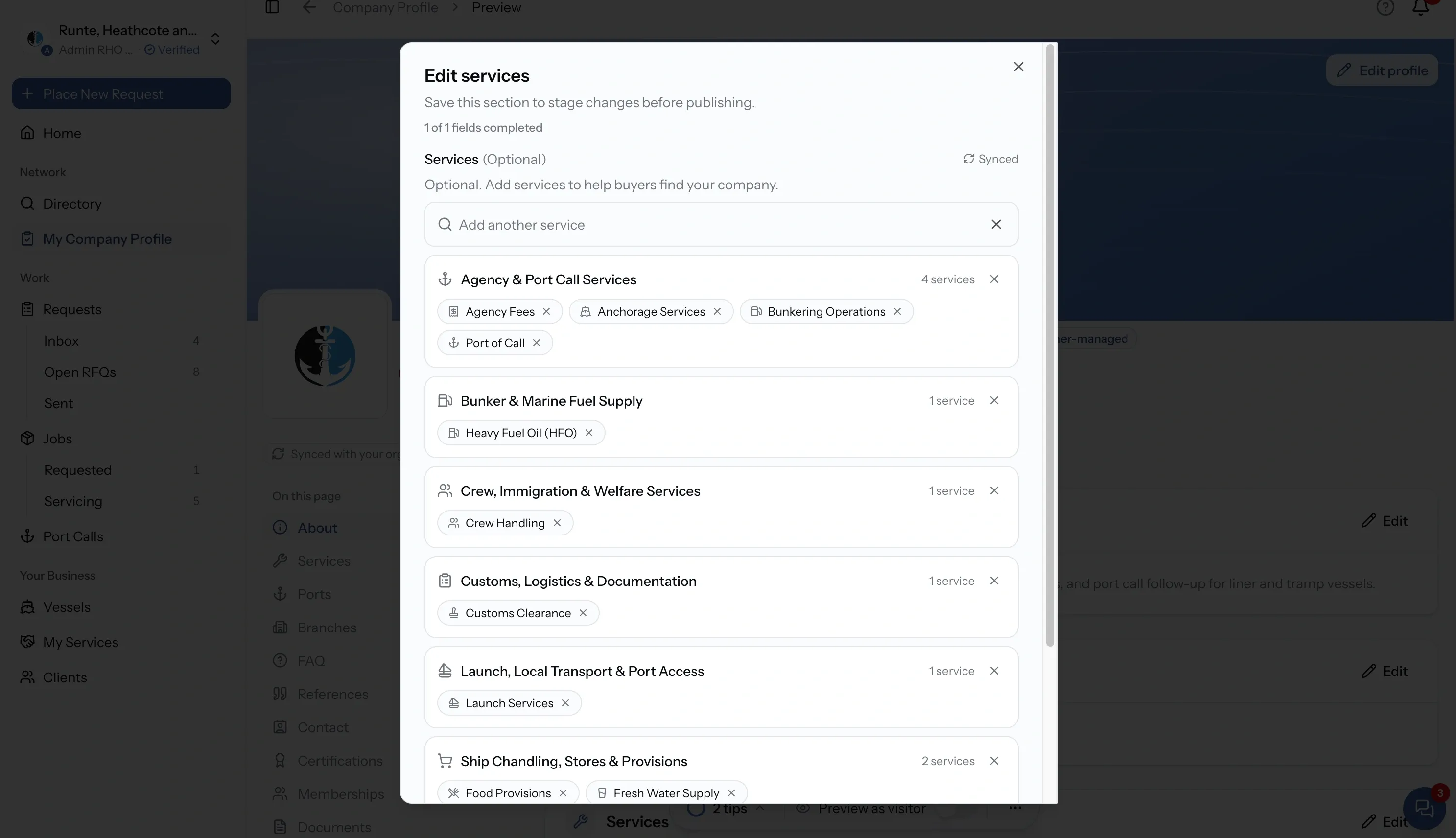 PortzApp edit services dialog on the company profile showing selectable service categories with a synced marker beside the field label
